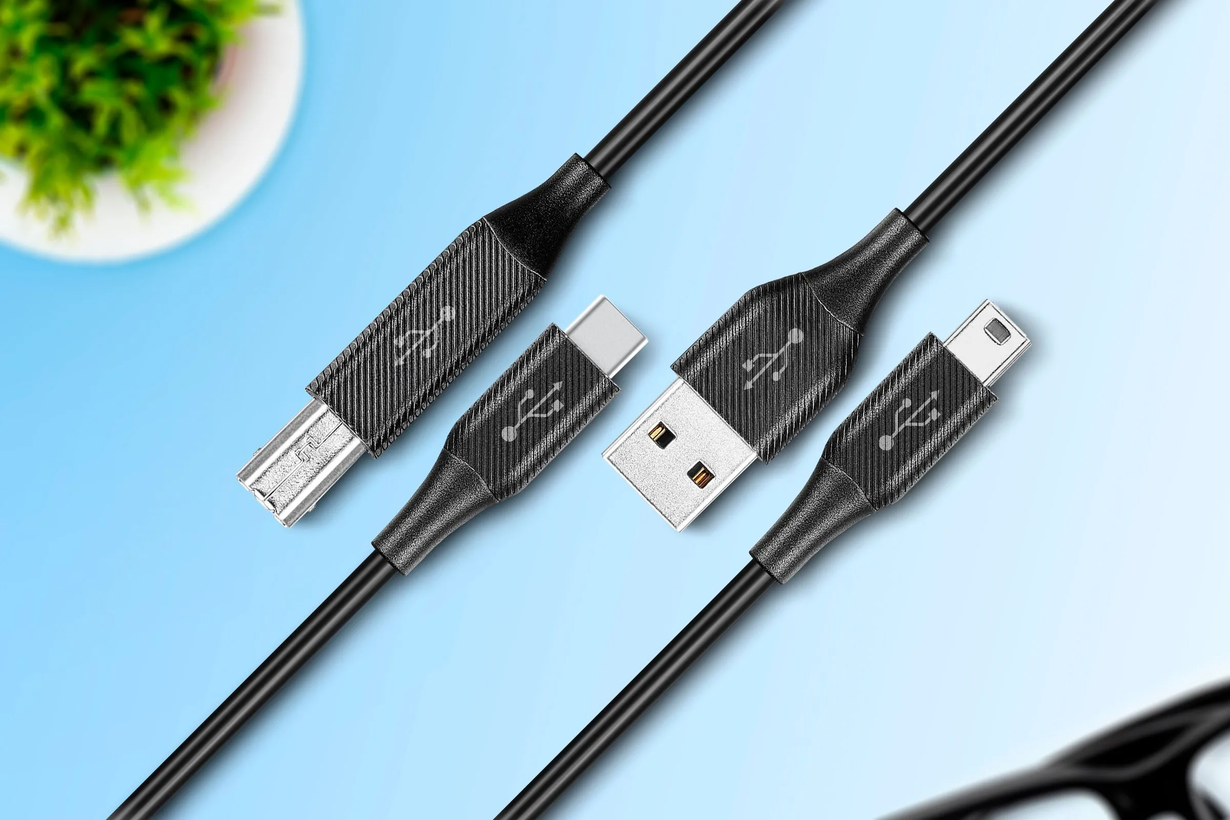 Các loại cáp USB thông dụng như USB-A, USB-C và Micro-USB đặt cạnh nhau, minh họa sự khác biệt về đầu cắm