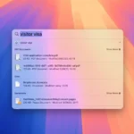 Cửa sổ tìm kiếm Spotlight trên màn hình MacBook hiển thị kết quả tìm kiếm ứng dụng và tệp tin.