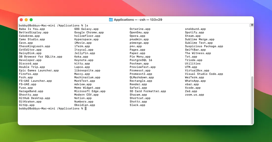 Danh sách nội dung thư mục Applications được hiển thị trong cửa sổ Terminal macOS.