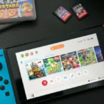 Máy chơi game Nintendo Switch với các băng game, minh họa khả năng quản lý dữ liệu lưu riêng biệt