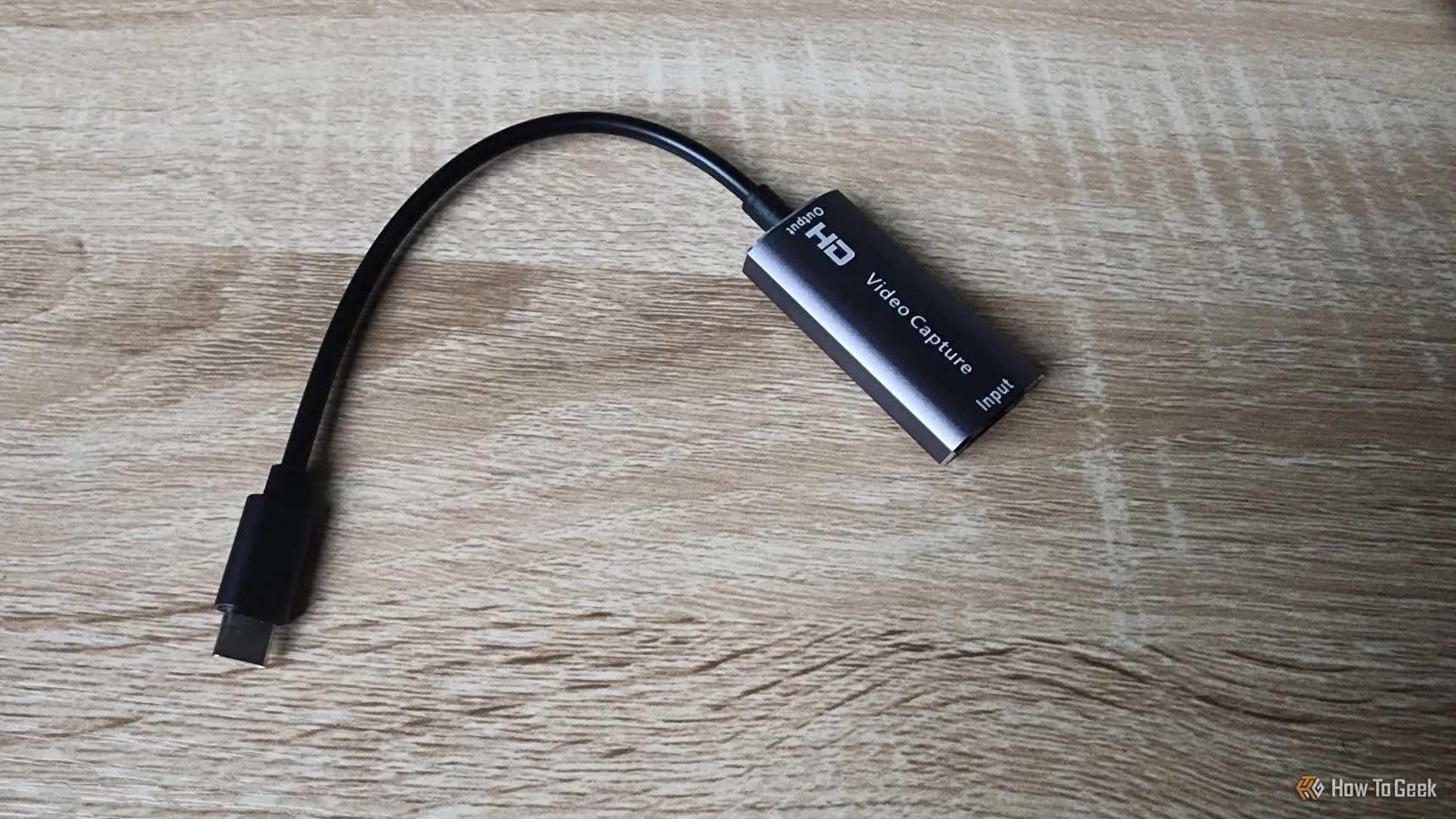 Thiết bị thu video USB (UVC) không tên, minh họa khả năng kết nối thiết bị ngoại vi với iPad để thu tín hiệu video.