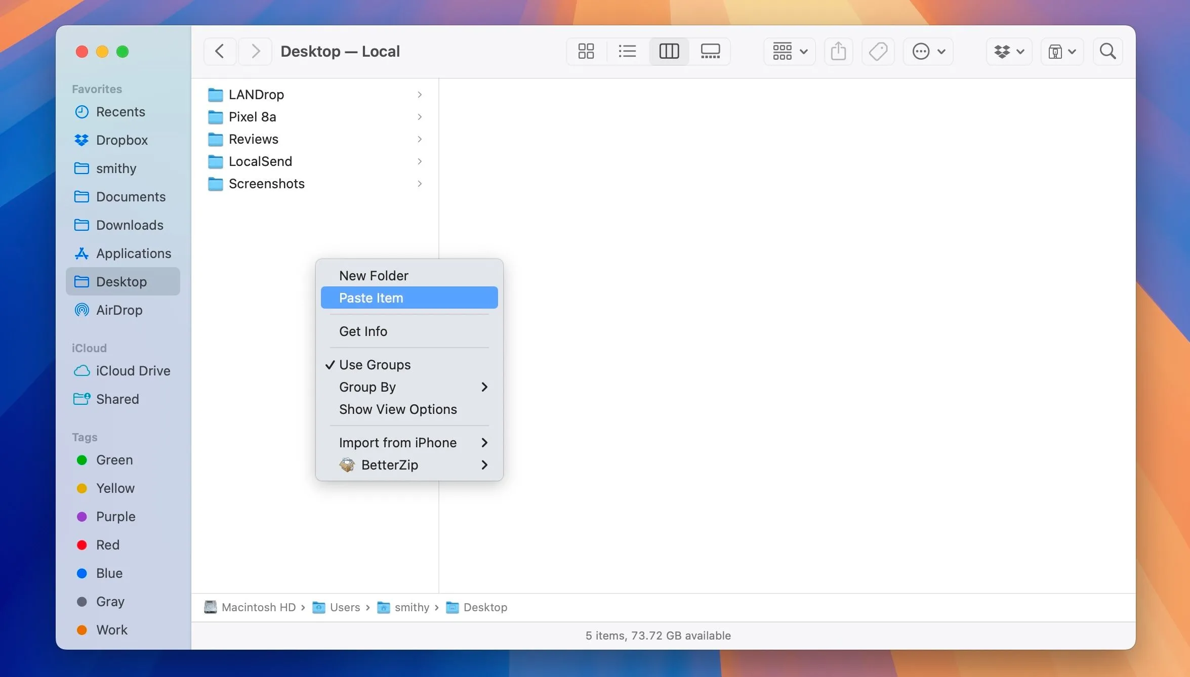 Tùy chọn 'Dán mục' trong ứng dụng Finder của macOS để dán một mục đã sao chép từ iPhone