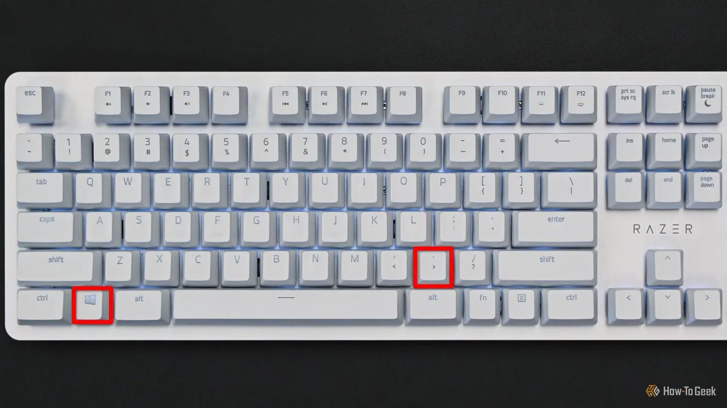 Bàn phím với phím Meta (Windows) và phím dấu chấm được tô đỏ, minh họa cách mở bảng chọn biểu tượng cảm xúc trên KDE Plasma.