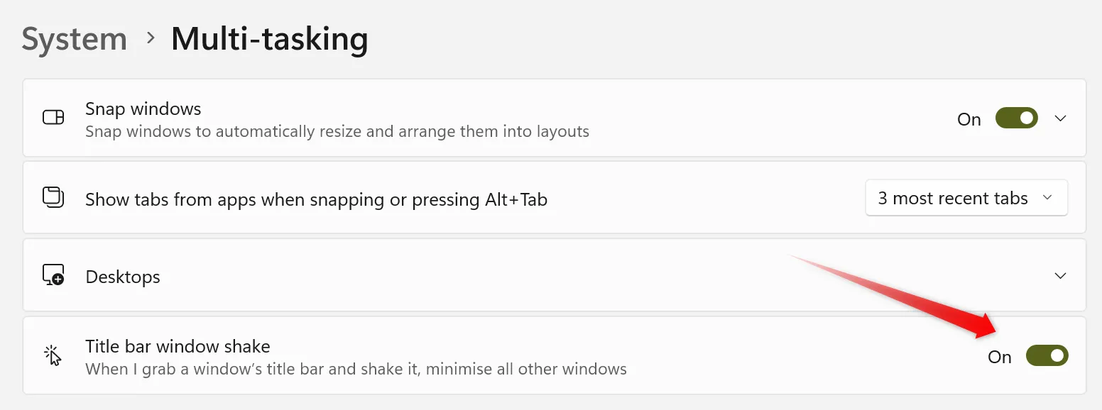 Bật tính năng Lắc Cửa Sổ (Title Bar Window Shake) trong cài đặt Đa nhiệm của Windows để thu nhỏ các cửa sổ khác một cách nhanh chóng.