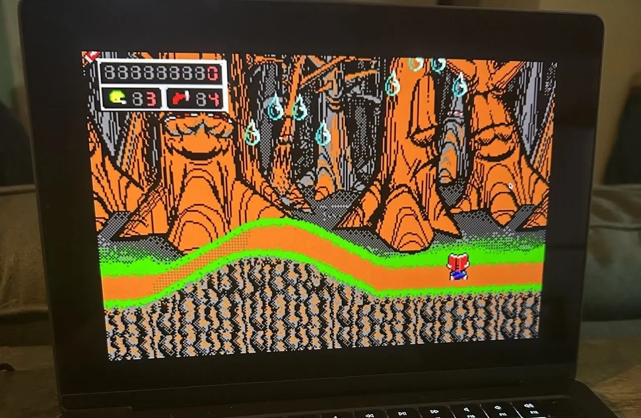 Commander Keen, game đi cảnh kinh điển của iD Software, đang hiển thị trên màn hình MacBook Pro.