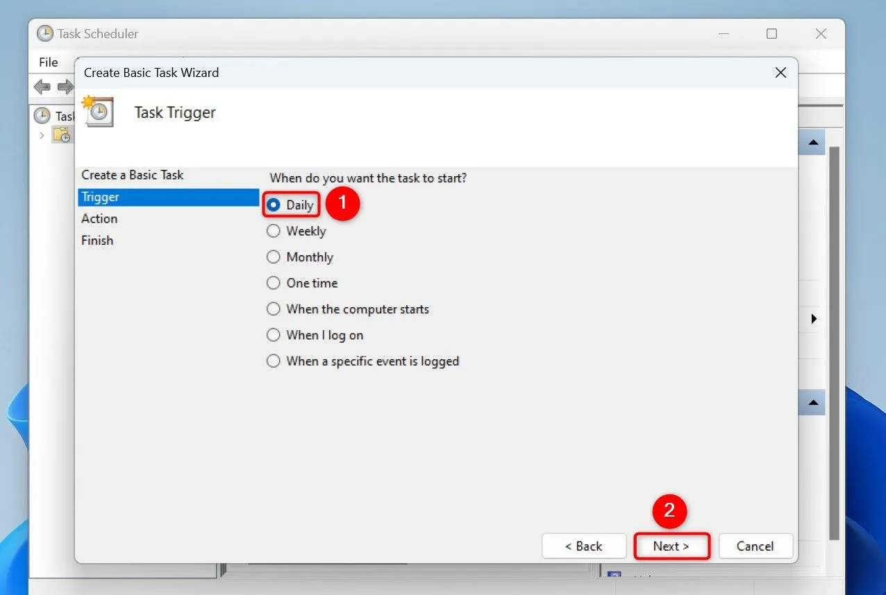 Cửa sổ Task Scheduler hiển thị các tùy chọn tần suất chạy tác vụ, với &quot;Daily&quot; được chọn để chạy hàng ngày