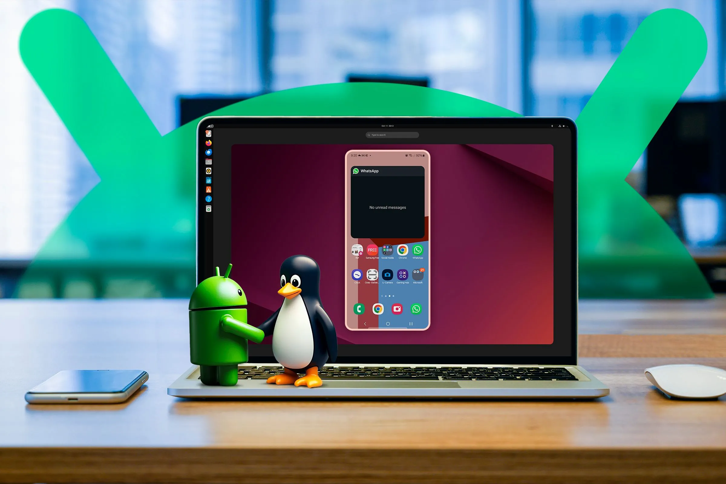 Màn hình laptop chạy Ubuntu với màn hình Android được phản chiếu và linh vật Android cùng Linux bắt tay nhau trên bàn phím