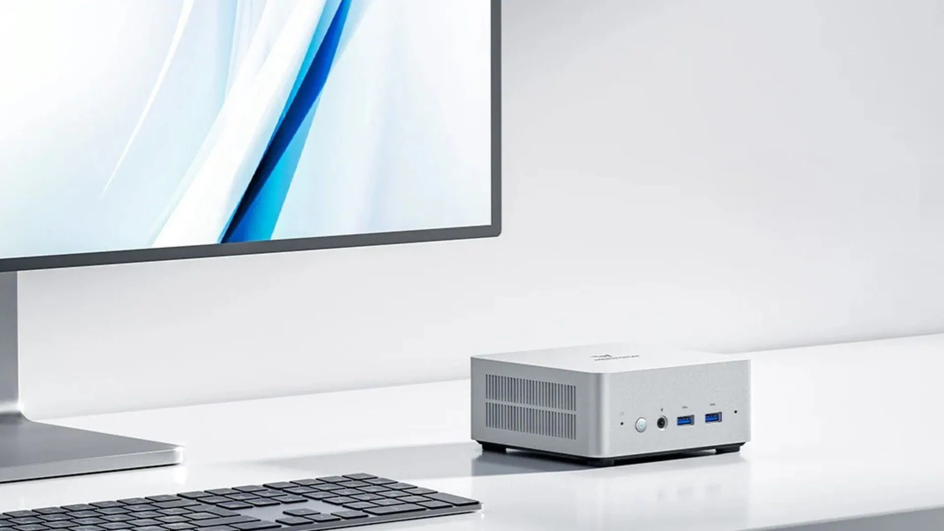 Mini PC MINISFORUM UN1250 đặt trên bàn