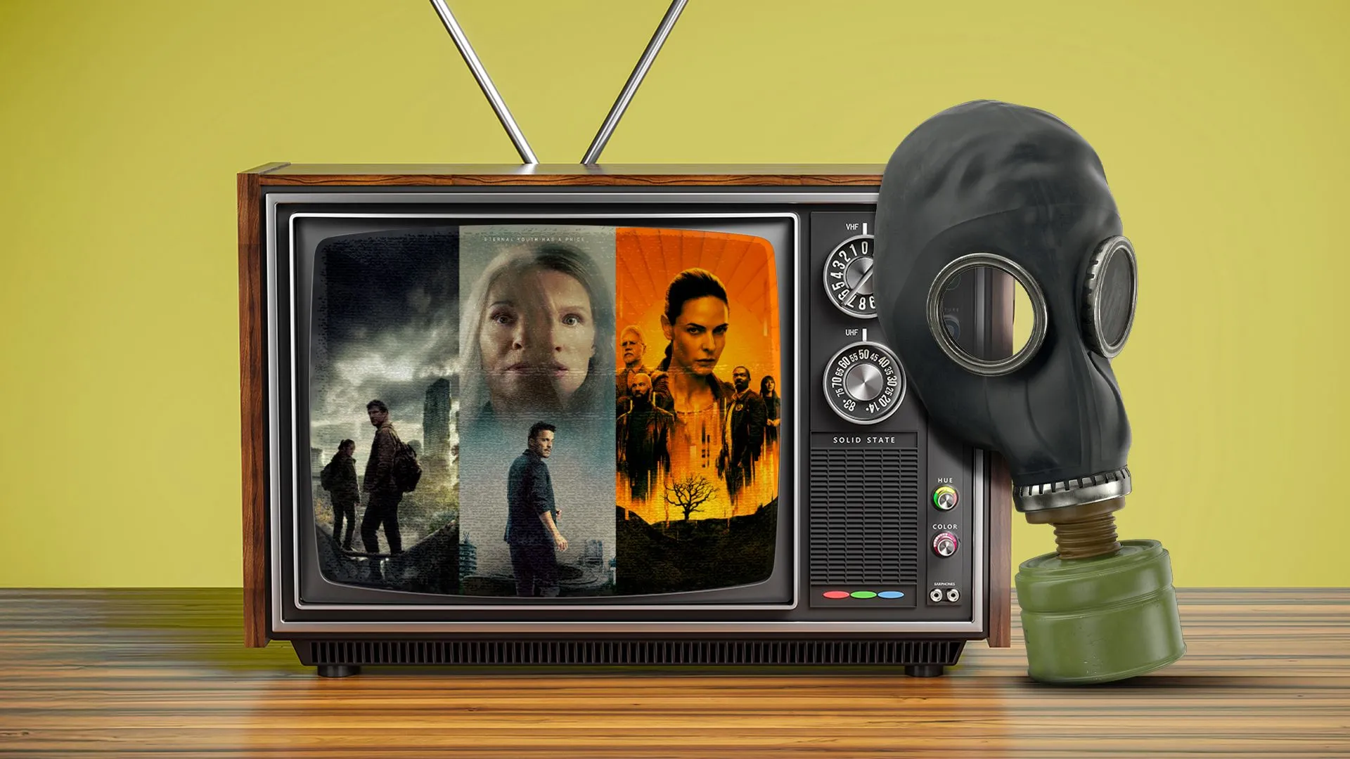 Một chiếc TV cũ và mặt nạ phòng độc bên cạnh, hình ảnh biểu trưng cho thế giới hậu tận thế đặc trưng của series game Fallout.