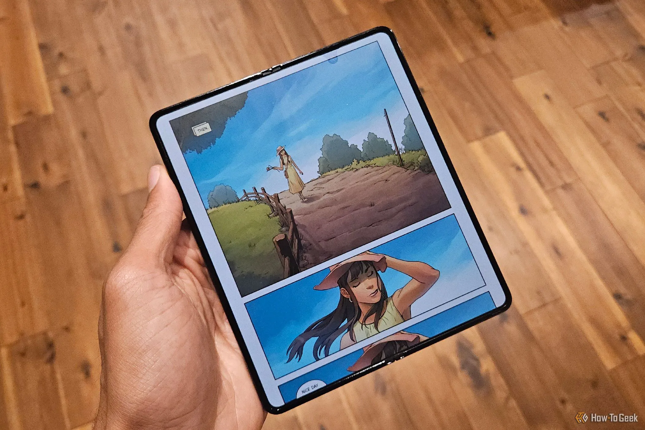 Một cuốn tiểu thuyết đồ họa được hiển thị trên màn hình lớn của Samsung Galaxy Z Fold 5, minh họa trải nghiệm đọc truyện tranh và tạp chí sống động.