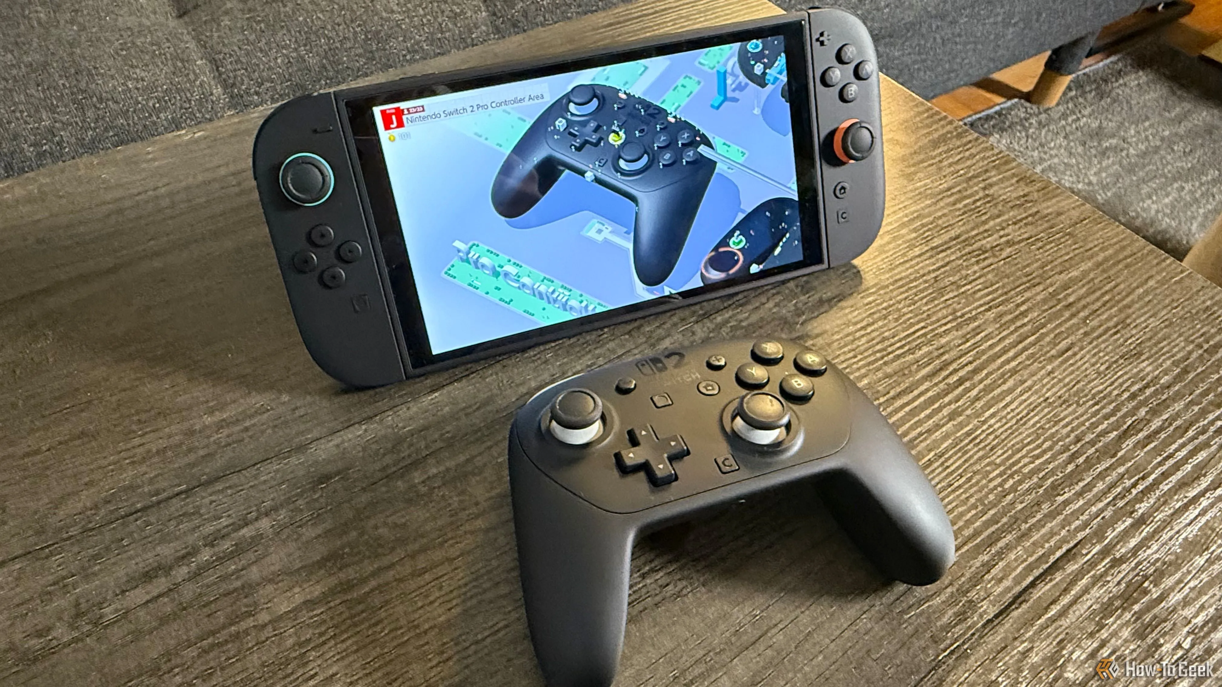 Tay cầm Nintendo Switch 2 Pro Controller và mô hình tay cầm trong sự kiện Nintendo Switch 2 Welcome Tour.