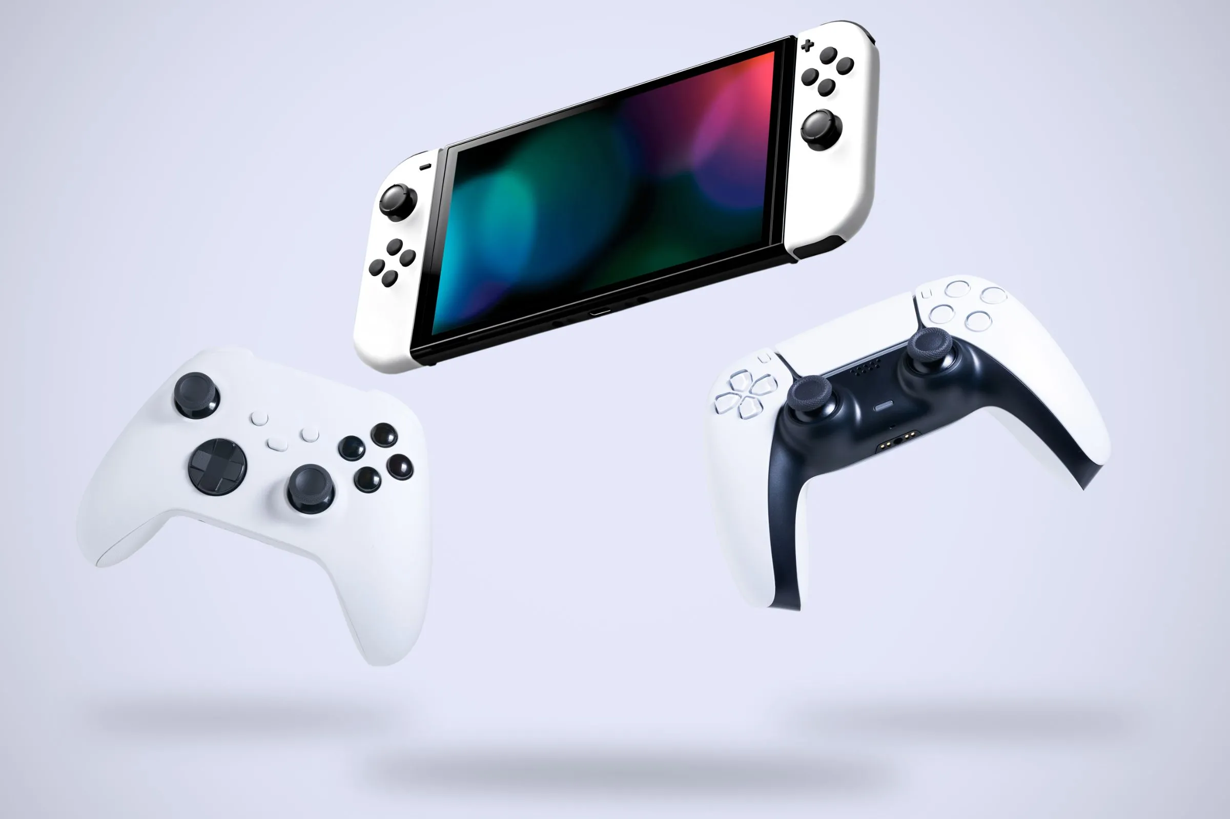 Bộ điều khiển PlayStation, Xbox và console Nintendo Switch giữa không trung.